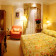 swiss hotel standart suite bedroom 3 56x56Отель Швейцарский